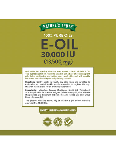 E Oil bottle with icons indicating paraben free, gluten free, and quality assured.