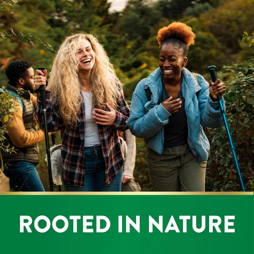 Diverse young adults hiking and laughing in a lush forest, for Beet Root. Banner reads: ROOTED IN NATURE.