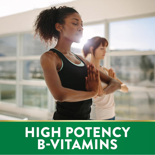 Two women meditating with a bottle of High Potency B-Vitamins.