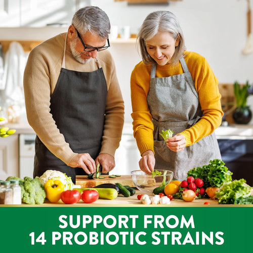 Senior couple in kitchen with text 'SUPPORT FROM 14 PROBIOTIC STRAINS', highlighting the product's benefits.