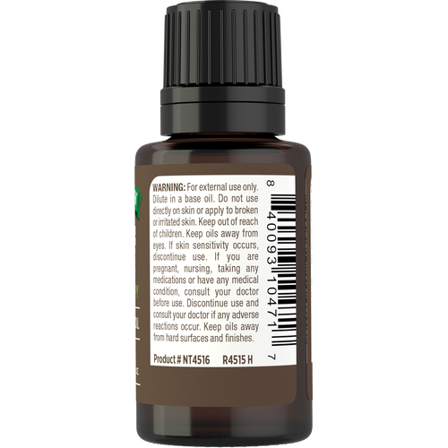 A 15 mL bottle of NT Clove Oil with a warning label and barcode.