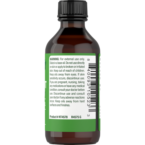 Natural Traditions Peppermint Oil 2 oz bottle with label showing Product # NT4578 and R4575 G.