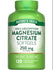 Hand holds a bulk supply of 120 Magnesium Citrate 250 mg quick release softgels.