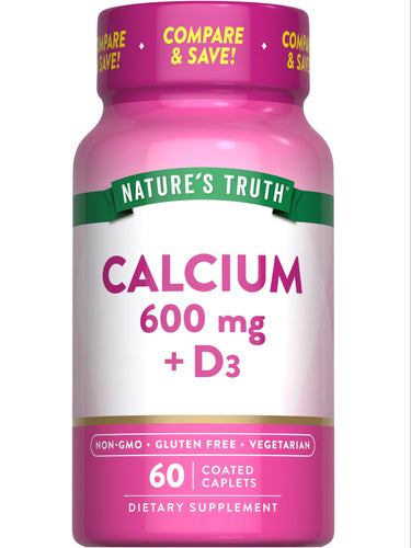 Bottle of Calcium 600 mg with Vitamin D3, containing 60 coated caplets, displayed on hand scale. Health supplement for bone support.