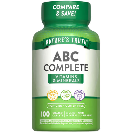 A hand holding a bulk scale of 100 coated caplets, emphasizing quantity and dosage form, suitable for health and wellness needs.