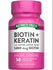 Hand holding a bottle of Biotin + Keratin with ALA Quick Release Capsules, 5,000 mcg Biotin, 50 count.