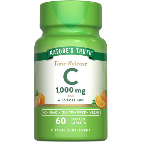 Nature's Truth Time Release C 1,000 mg with Wild Rose Hips, 60 coated caplets on a hand scale.
