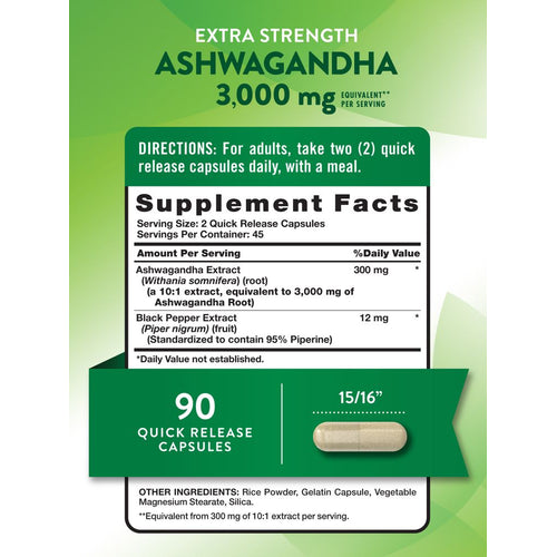 A 15/16 inch long Ashwagandha Quick Release Capsule shown on a bulk scale in a hand.