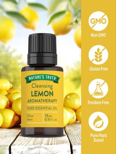 Nature's Truth Cleansing Lemon Aromatherapy Pure Essential Oil bottle, 15 mL (0.51 FL. OZ.) shown on hand scale.
