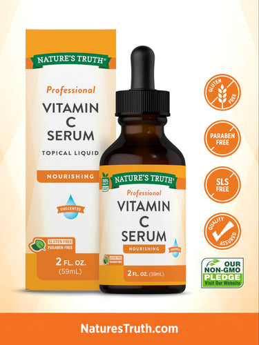 Bottle of Professional Vitamin C Serum, Topical Liquid, 2 FL. OZ. (59mL), held in hand.