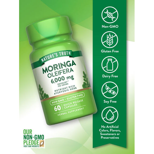 Hand holding Moringa Oleifera 6,000 mg Quick Release Capsules bottle, 60 count.
