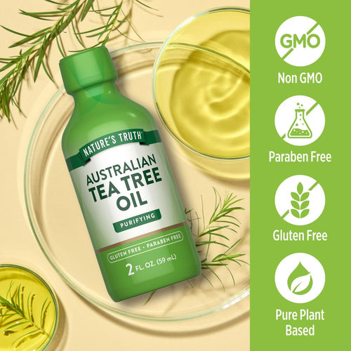 Bottle of Tea Tree Oil labeled as Non GMO, Paraben Free, Gluten Free, and Pure Plant Based.