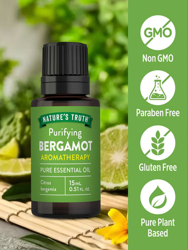 A bottle of bergamot oil labeled as Non GMO, Paraben Free, Gluten Free, and Pure Plant Based.