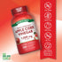 Triple Strength Apple Cider Vinegar 1,200 mg Quick Release Capsules shown on a hand scale for size reference.