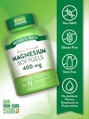 A hand holding a bottle of Magnesium Softgels, 400 mg, 72 count, showcasing the product size and packaging.