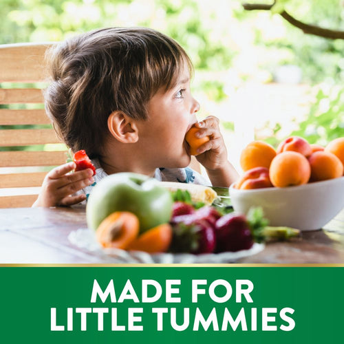 Young boy eating an apricot with 'MADE FOR LITTLE TUMMIES' text, related to Kids Probiotic Gummy product.