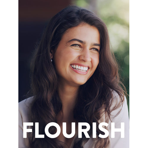 A young woman smiles and glances sideways, with the word 'FLOURISH' beside her.