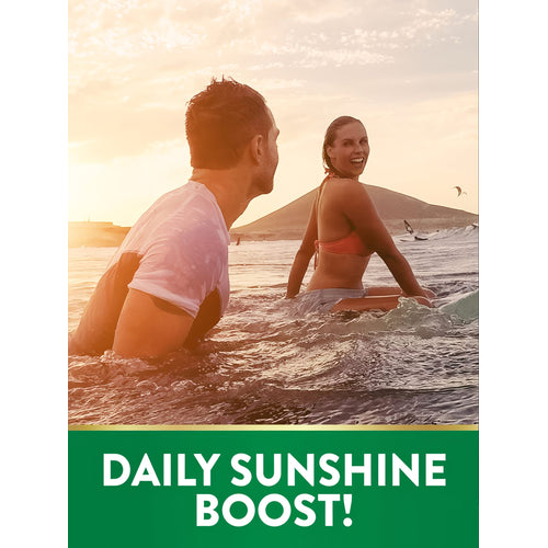 Young man and woman surfing in the ocean at sunset with graphic text 'DAILY SUNSHINE BOOST!', NT D3.