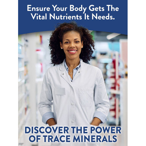 Young adult female pharmacist smiling in a lab coat in a pharmacy setting with Trace Minerals.