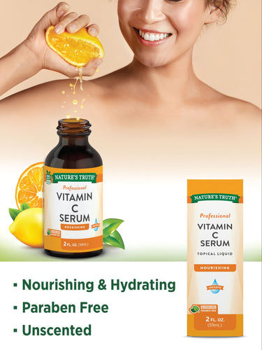 A woman squeezes a fresh orange over a professional Vitamin C Serum bottle (2 fl oz, 59mL).