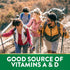 Young adults hiking outdoors and smiling. Graphic text: 'GOOD SOURCE OF VITAMINS A & D'.