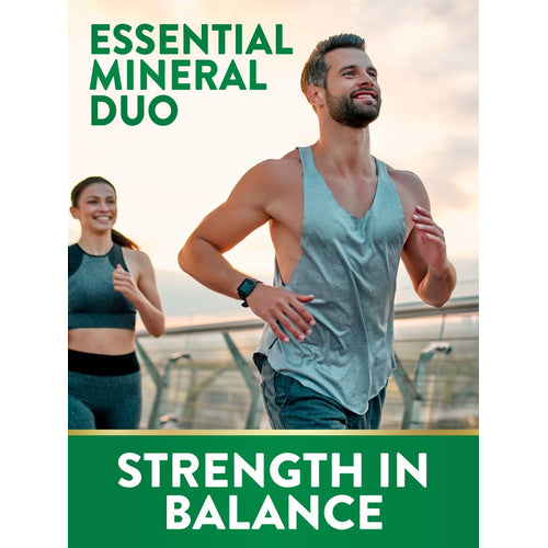 Adult man and woman jogging outdoors with text 'ESSENTIAL MINERAL DUO' and 'STRENGTH IN BALANCE'.