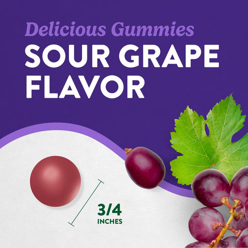 Sour grape-flavored gummy measuring three-fourths of an inch on bulk scale with a hand for reference.