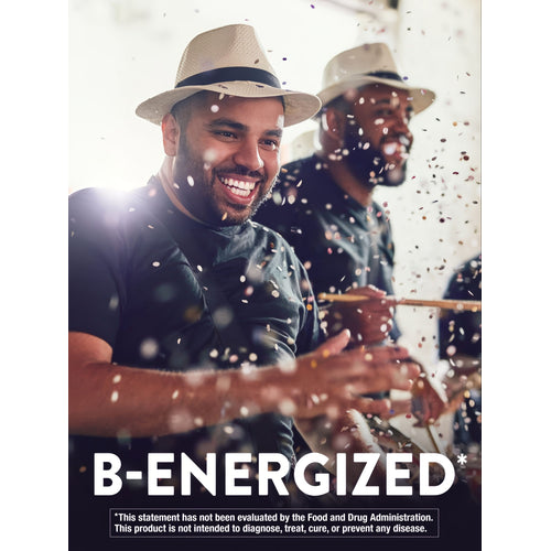 Two adult men laughing and playing drums with confetti around, featuring B-ENERGIZED branding.