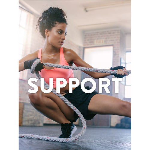 Young adult woman intensely pulling a thick rope during a gym workout, with the word 'SUPPORT' overlaid.
