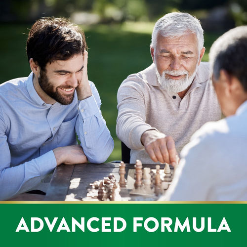 Younger and older men smiling while playing chess outdoors. Green banner at bottom with white text 'ADVANCED FORMULA'.