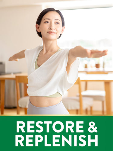 A woman practices yoga in a warrior pose, next to bold text stating 'RESTORE & REPLENISH'.