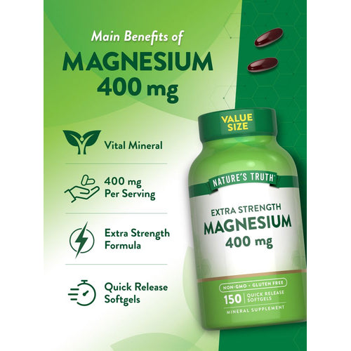 Two dark red/brown Magnesium 400 mg softgels on a hand scale.
