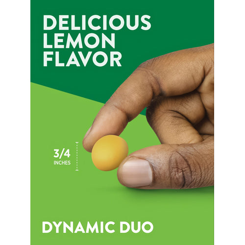 A hand holds a lemon-flavored gummy measuring three-fourths of an inch.