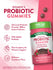 Two dark red gummies next to a bottle labeled NT Women's Probiotic, containing 30 gummies.