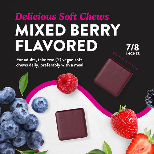 A Mixed Berry flavored dark red square soft chew, measuring 7/8 inches, shown on a bulk scale for size comparison.