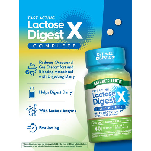 A hand holding two round Lactose Digest Complete X tablets.