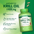 Two 2,000 mg Antarctic Krill Oil softgels shown on a hand for scale.