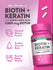 Two white quick release capsules with Biotin and Keratin, containing 5,000 mcg Biotin and Alpha Lipoic Acid.