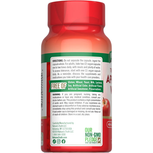 Bottle of NT Apple Cider Vinegar 60 Veg Capsules shown on hand scale.
