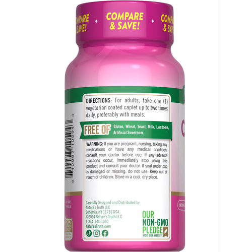 A 600 mg vegetarian caplet rests on a hand scale, illustrating its size and weight for visual reference.