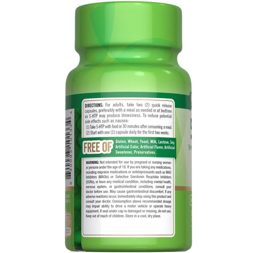 Hand holding bottle of 5-HTP 200 mg quick release capsules.