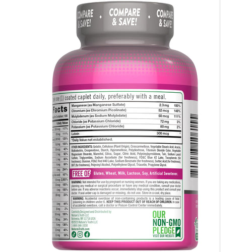 A hand holds NT ABC Complete Women's 50+ Multivitamin, featuring 100 coated caplets for mature women's health.