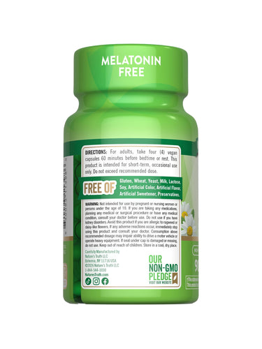 Hand holding a bottle of NT Calm Caps, containing 90 vegan capsules for stress support and relaxation.