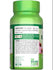 Hand holding a bottle of NT Echinacea 1300 mg, containing 100 vegan capsules, visible against a bulk scale background.