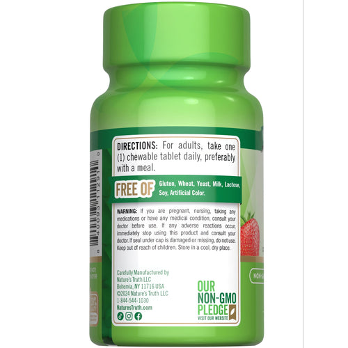 Hand holding a scale weighing a bottle labeled 100 chewable tablets, highlighting supplement quantity in bulk format.