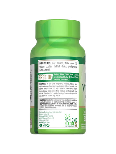 NT Iron + Vitamin C bottle with 90 vegan-coated tablets, shown in hand for scale.