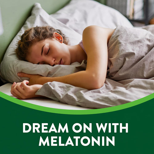 A young woman sleeps peacefully in bed with a bottle of Melatonin on the nightstand.