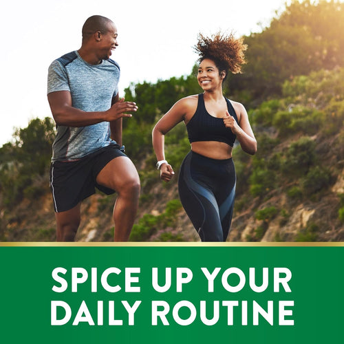 Smiling man and woman jogging outdoors, holding a bottle of Turmeric.