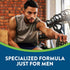 Young man stretching in a gym, featuring NT Mens Multi 70 Gummies for health.