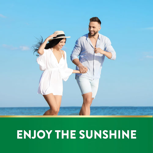 Man and woman running hand-in-hand on a sunny beach by the ocean for NT D3 Softgels.